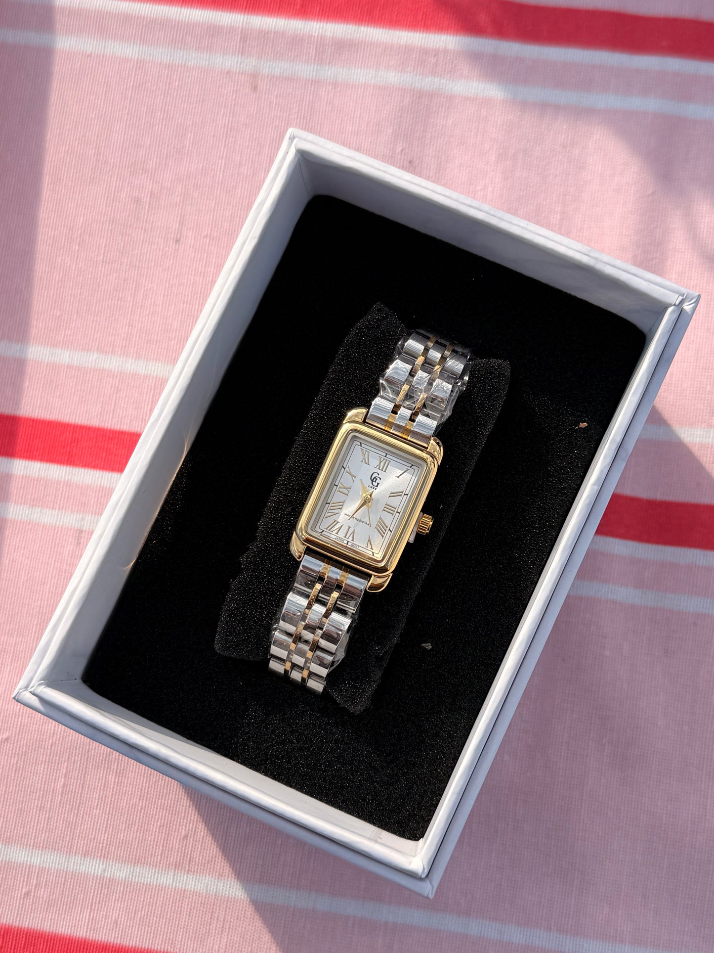 Montre mix doré et argenté blanc modèle SHINY
